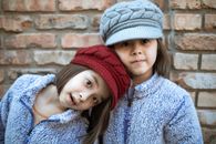 2 Girl Wearing Red Knit Cap