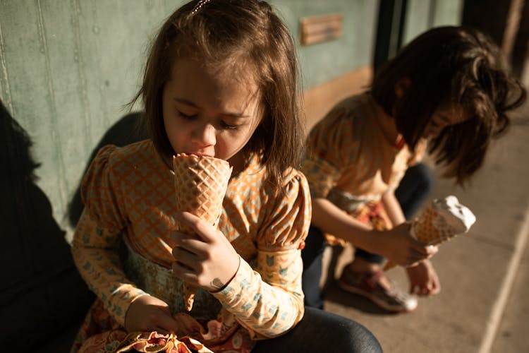 Girls Eating Ice Cream Cones