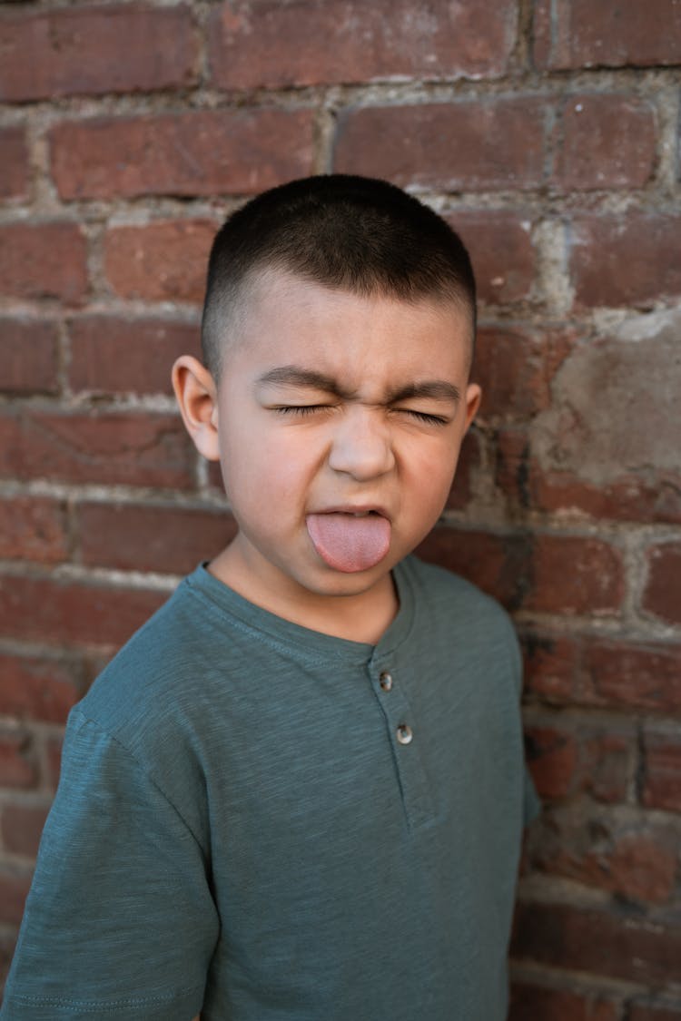 Boy Tongue Out Photo 