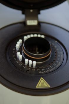 Detailed view of a LightCycler chamber in a laboratory setting.