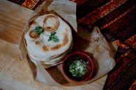 Bread With Red Sauce on White Paper