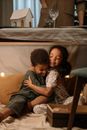 Kids Sitting Under the Table