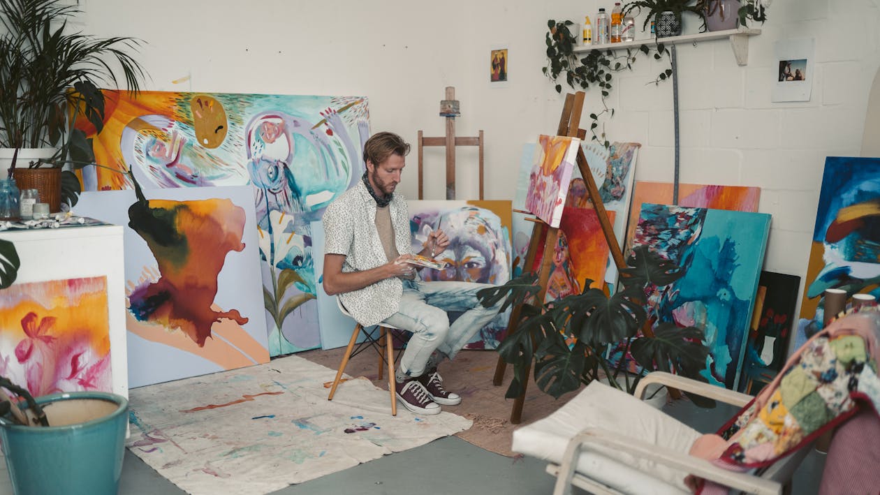 Free Artworks of an Artist in His Art Studio Stock Photo