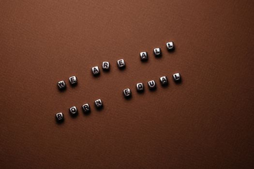Silver Beads on Orange Surface