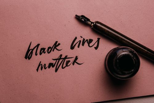 Free A close-up of Black Lives Matter calligraphy using a fountain pen and ink. Stock Photo