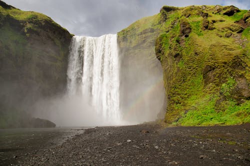 Waterfalls Under White Cloudy Sky