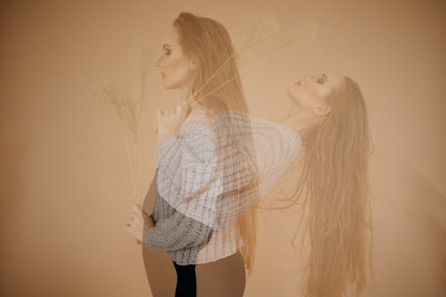 Double Exposure Photo of a Woman Standing and Bending Backwards