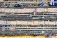 Rows of pathways above litter in poor town