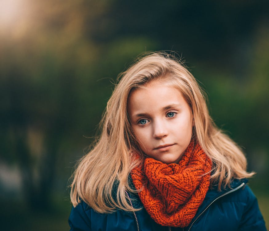 Free Girl Wearing Orange Scarf Selective Focus Photography Stock Photo