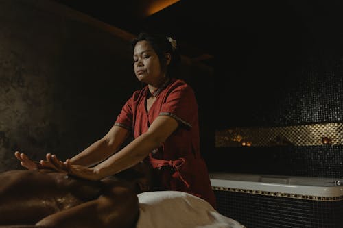 A Masseuse Doing a Massage