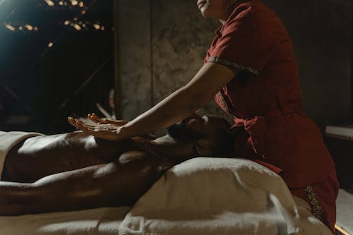 Free A Masseuse Doing a Massage Stock Photo