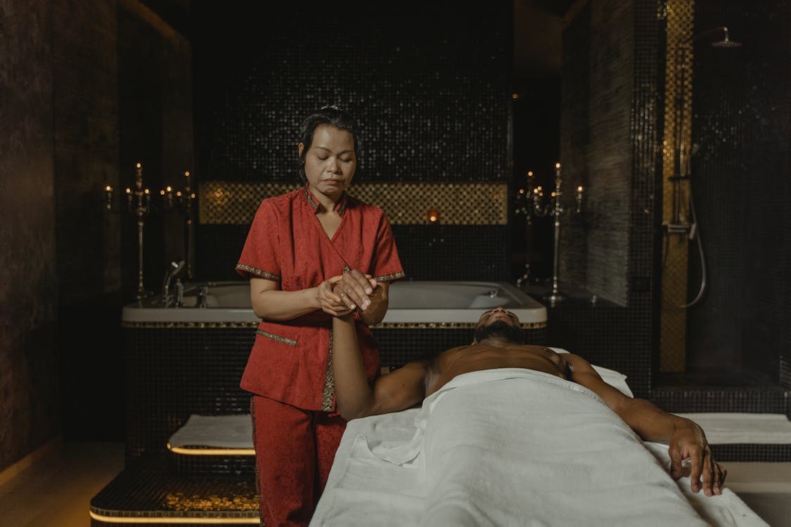 A Masseuse Doing a Massage