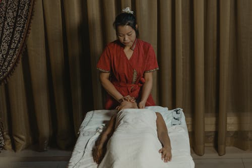 A Masseuse Doing a Massage