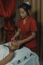 A Masseuse Doing a Massage