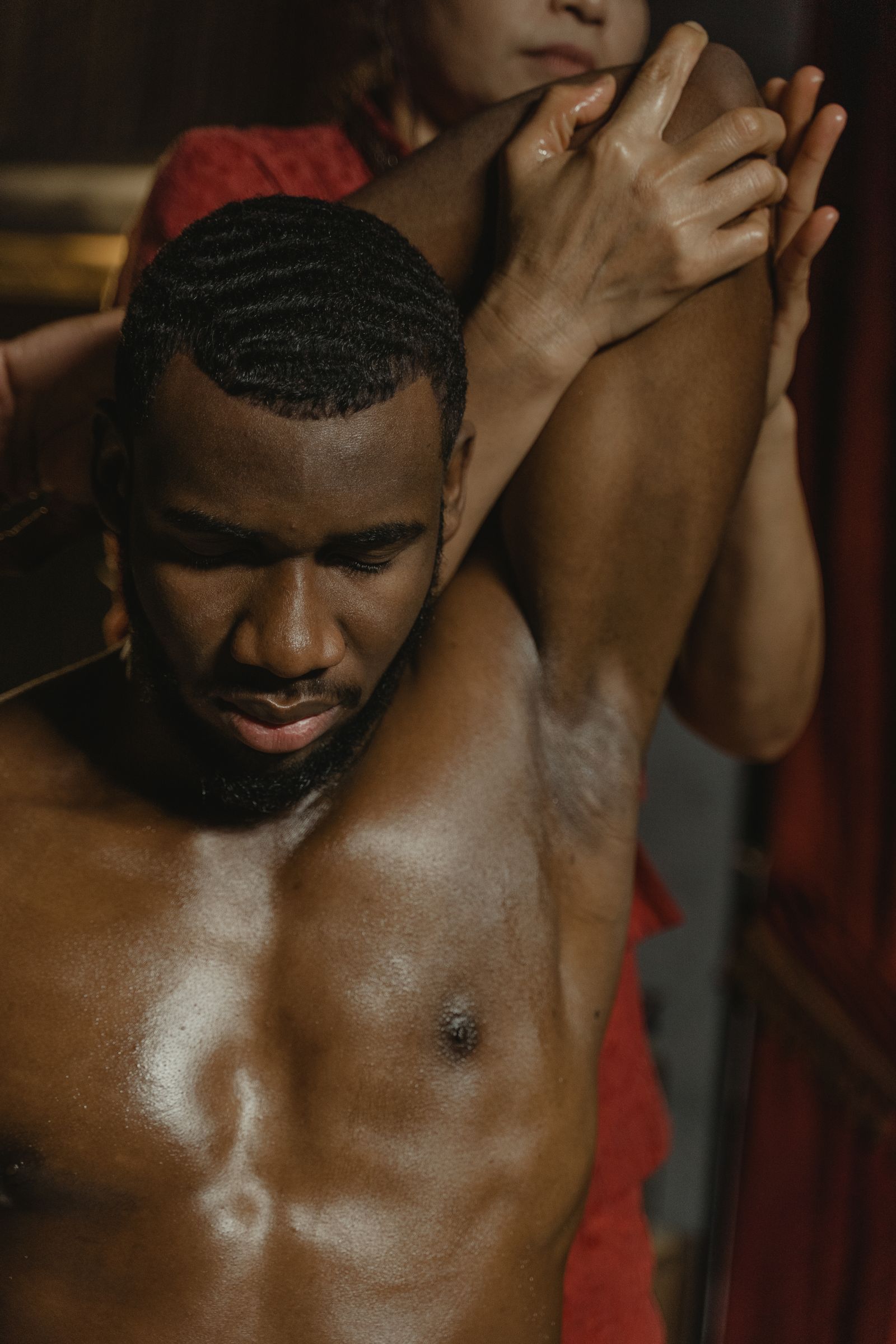 Black man receiving a relaxing professional massage