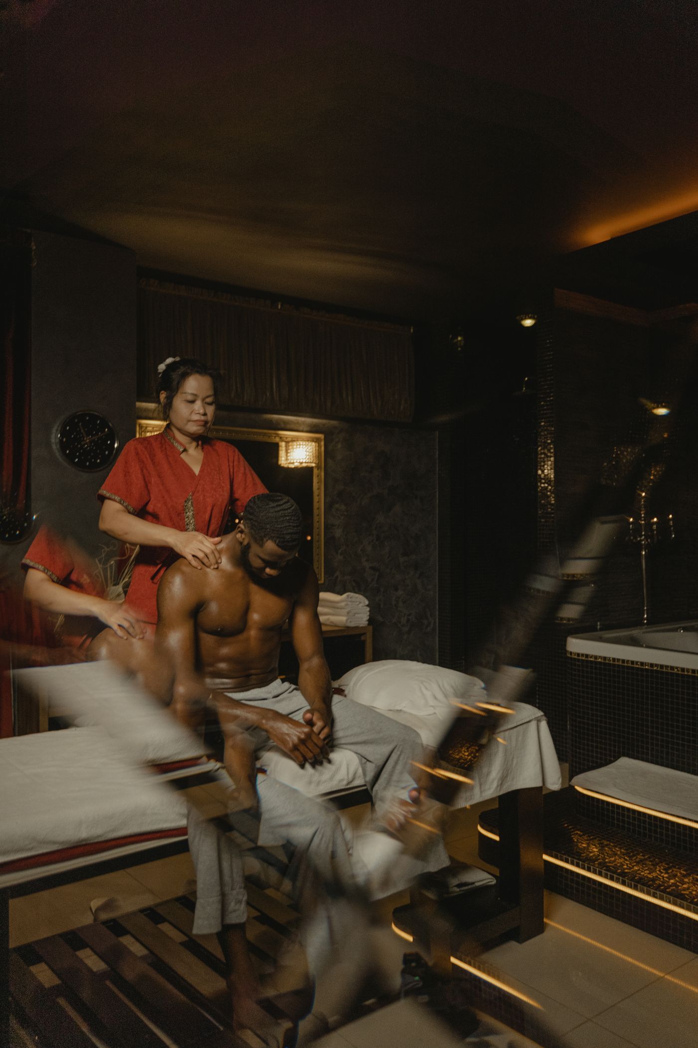 Black male client receiving professional spa care