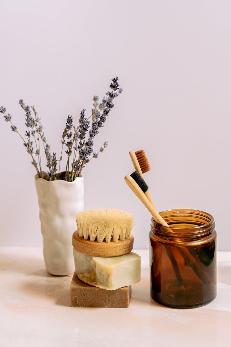 Lavender Flowers In White Ceramic Vase