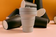 White Disposable Cup on White Table