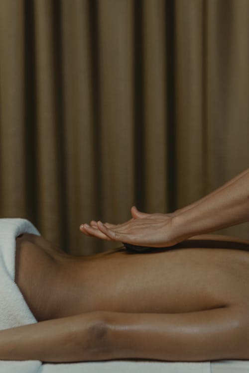 Free Person Getting a Body Massage Stock Photo