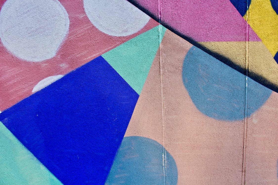 Colorful Shapes and Patterns Painted on Flat Surface