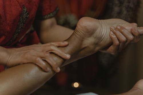 Close-Up Shot of a Person Doing a Massage on a Foot