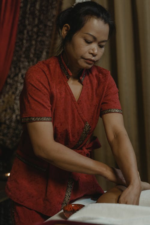 A Masseuse Doing a Massage