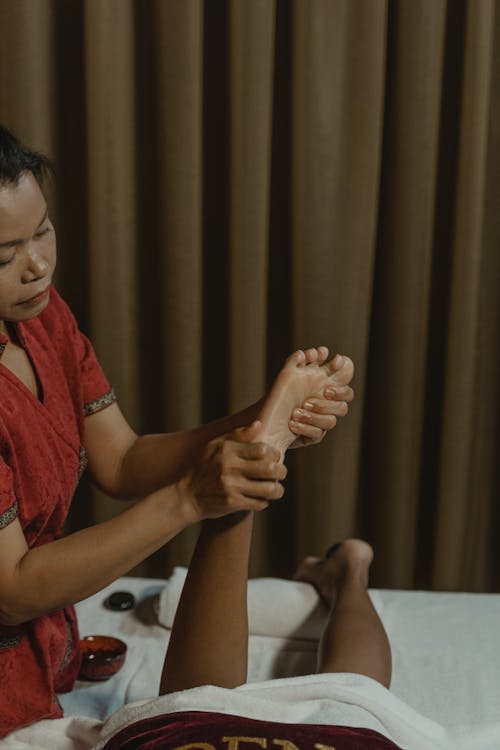 A Masseuse Doing a Massage