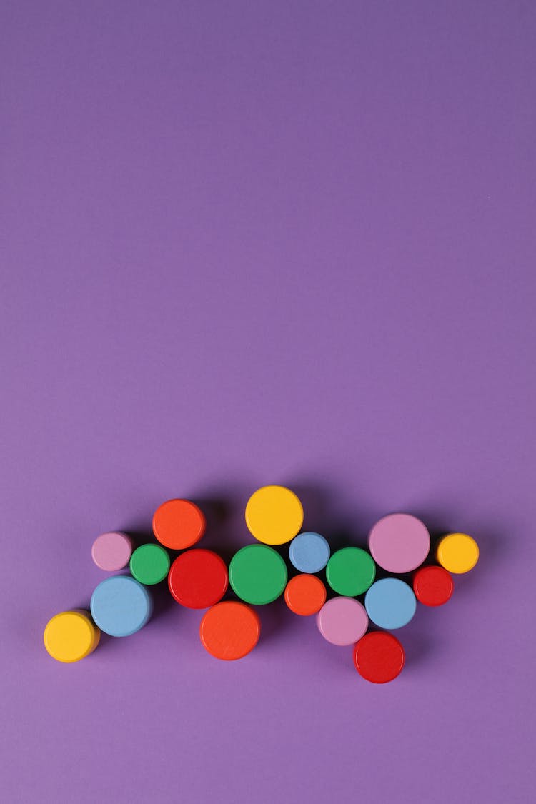 Close-up Of Colorful Circles On Purple Background