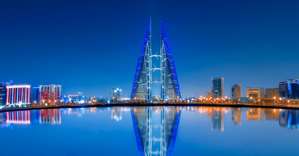 Bahrain's night skyline reflected in the Arabian Gulf waters