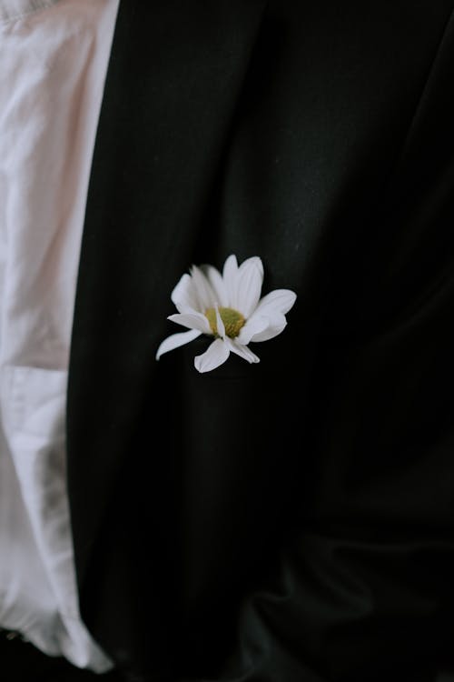 Close-up of a White Flower in a Pocket of a Suit 