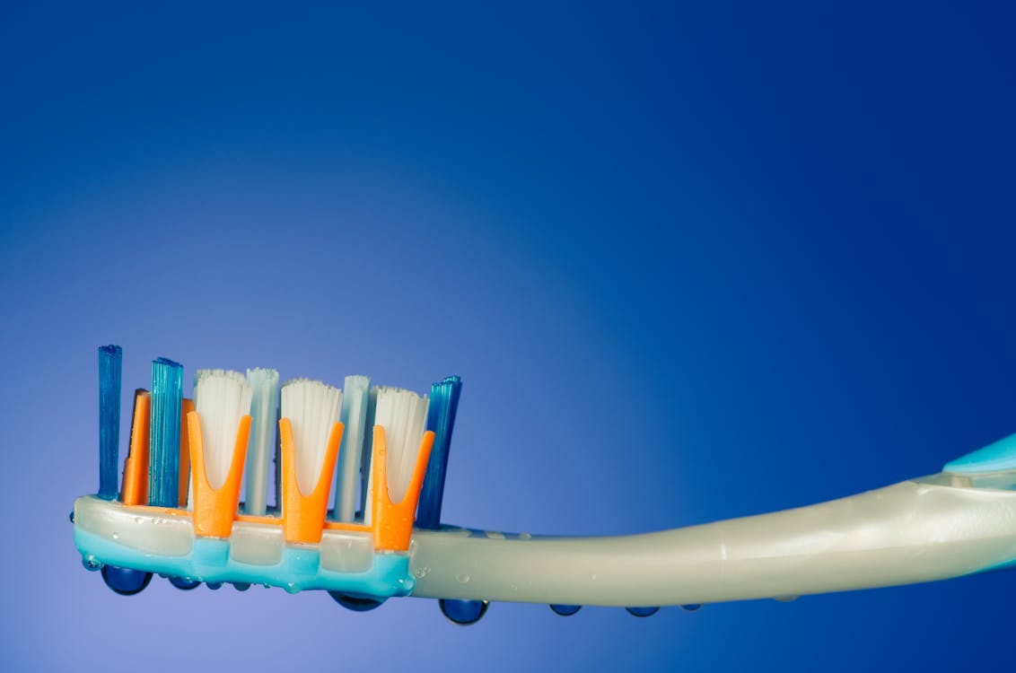 A Close-Up Shot of a Toothbrush · Free Stock Photo