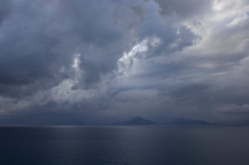 Ingyenes stockfotó felhők, felhős ég, óceán témában Stockfotó