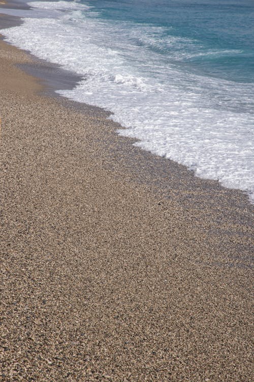 Sea Waves on Brown Sand 