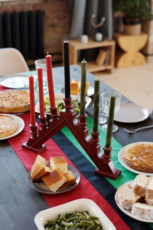 Free Photo Of Candle Holder Surrounded By Dishes Stock Photo
