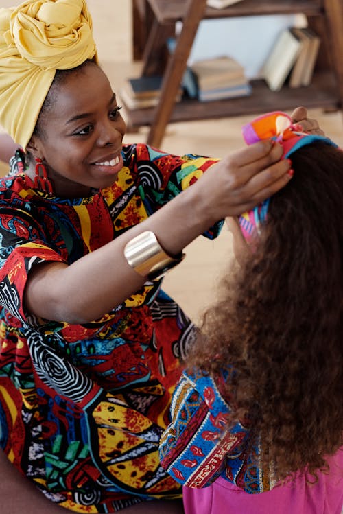 Free Photo Of Woman Fixing Girl's Headband Stock Photo