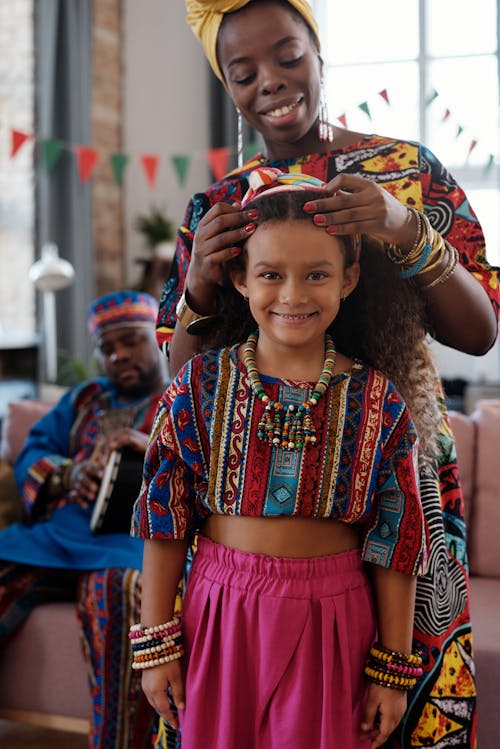 Free Photo Of Mother Fixing Her Daughter's Headband Stock Photo