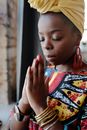 Close-Up Photo Of Woman Praying