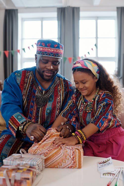 Photo Of Girl Wrapping A Gift 