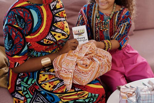 Photo Of People Holding A Greeting Card