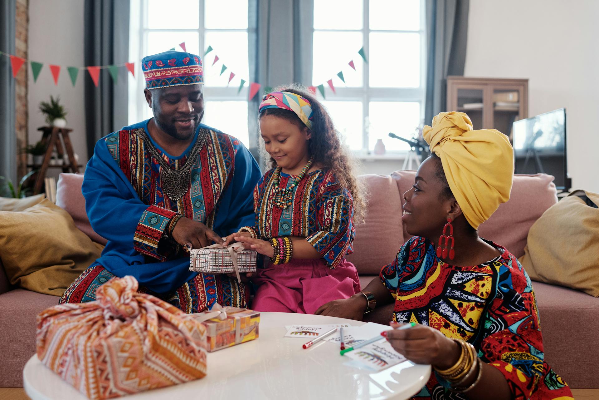Photo Of Family Wrapping Gifts