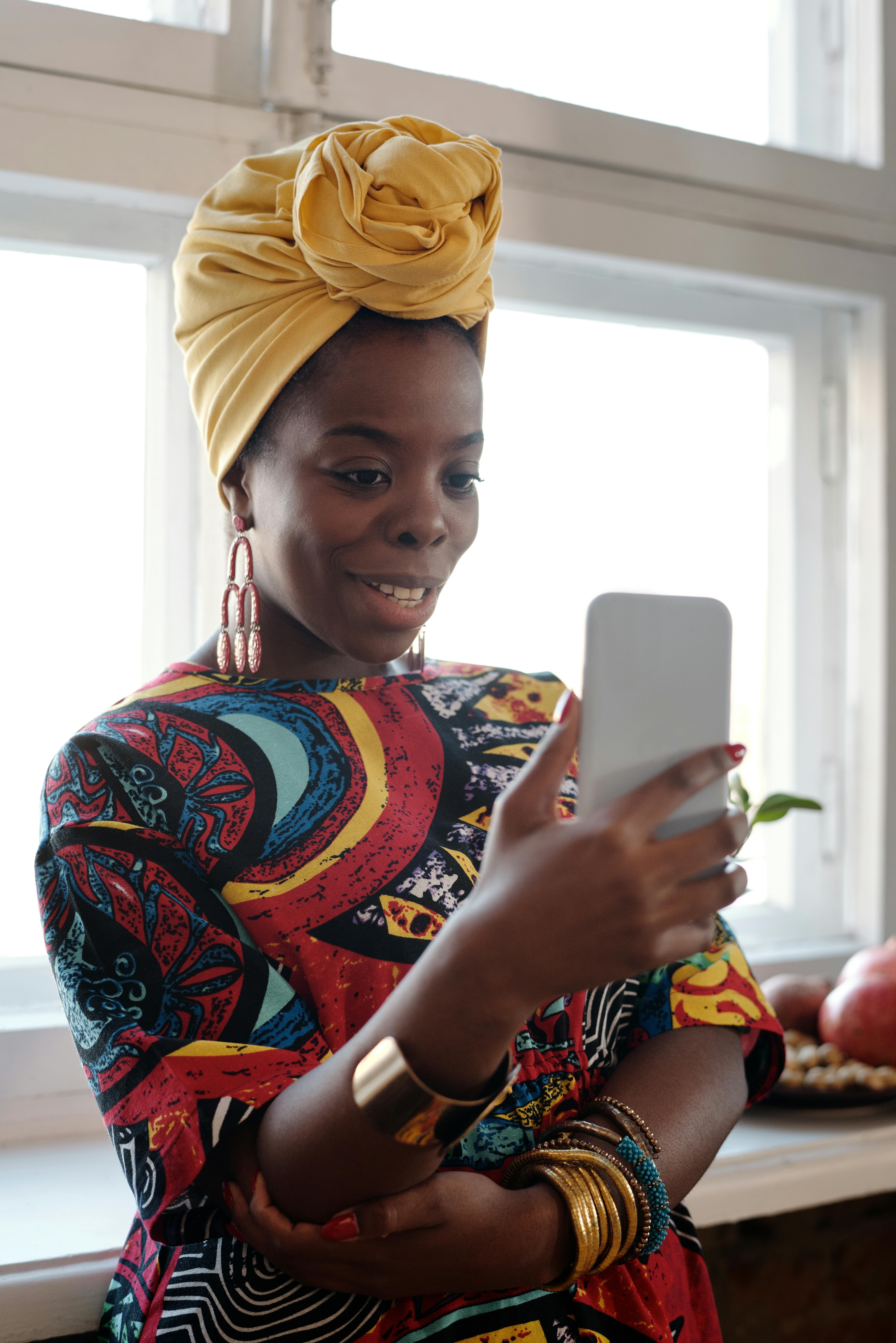 photo of woman having a video call on her phone