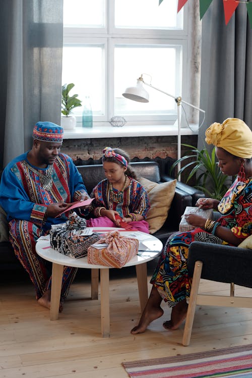 Photo Of Family Preparing Gifts