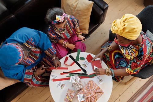 Photo Of Family Wrapping Gifts