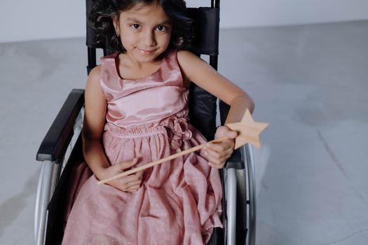 Girl in Pink Sleeveless Dress Sitting on Black Chair