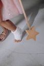 Girl in Pink Pants and Brown Leather Sandals Standing on White Floor Tiles