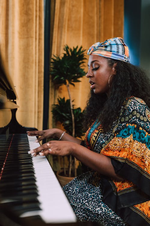 Free Photo Of Woman Playing Piano  Stock Photo