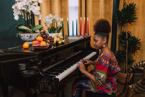 Free Photo Of Woman Playing Piano Stock Photo