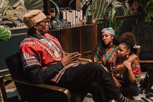 Free Photo Of People Sitting Together Stock Photo