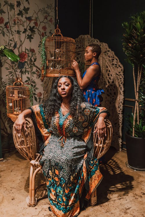 Two Women Wearing Different Styles Of Kaftan Dress