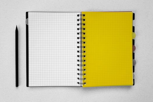 Black Pencil and a Spiral Notebook
